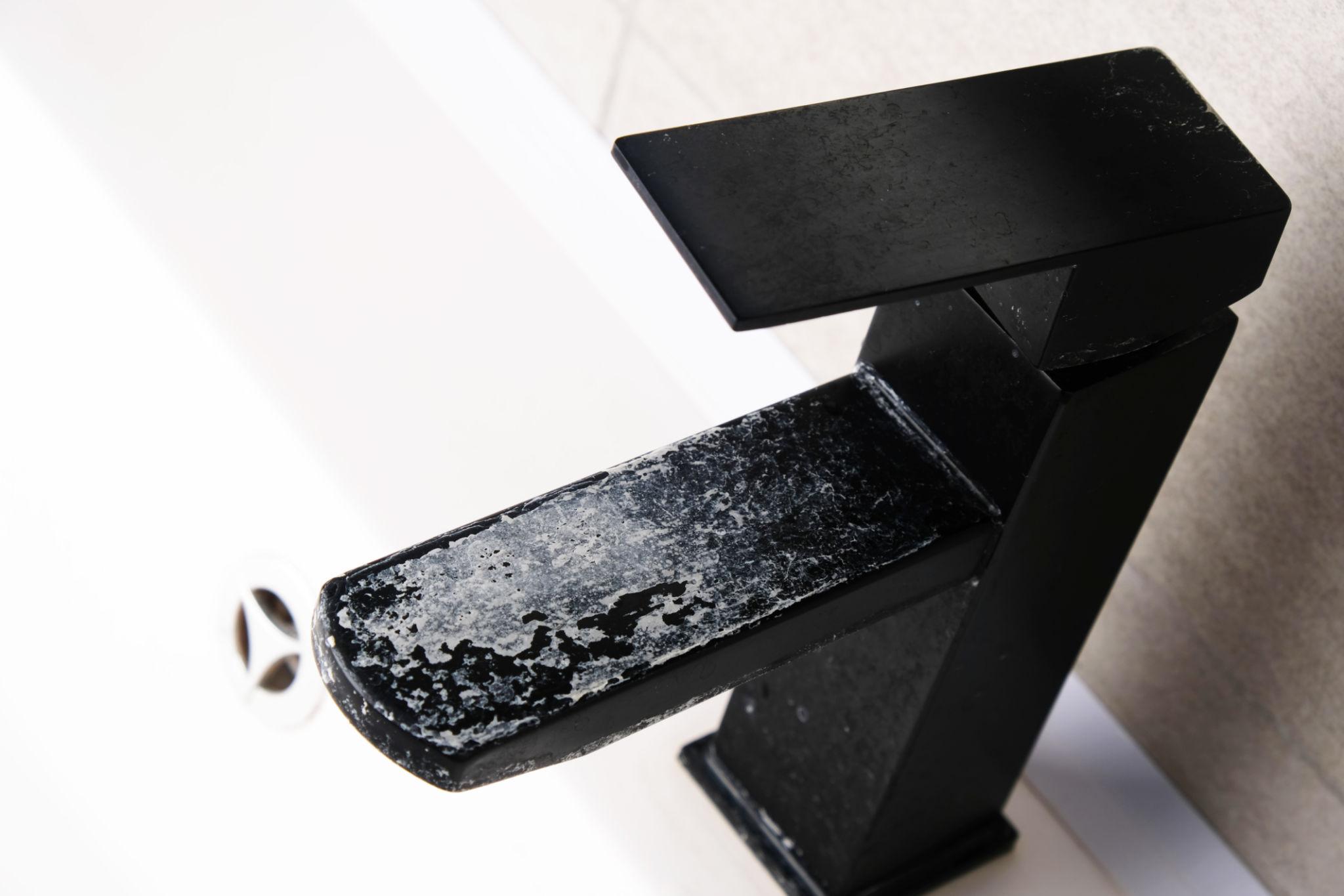 White spots and scale buildup on fixtures